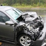 crushed hood of car